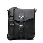 10" Convertible Crossbody in Black, front view with buckled flap, drawstring ties and strap