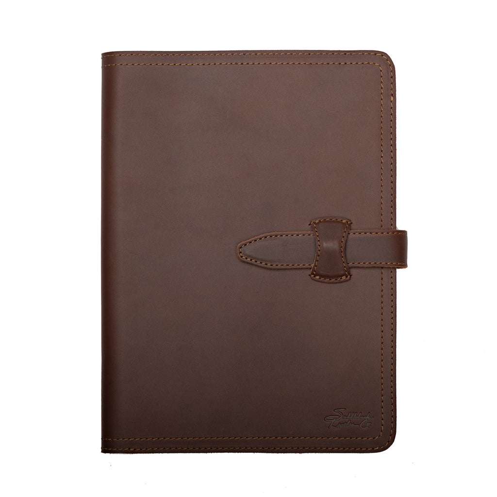 Large Leather Portfolio in Chestnut, closed, straight-on front view with strap closure and embossed logo