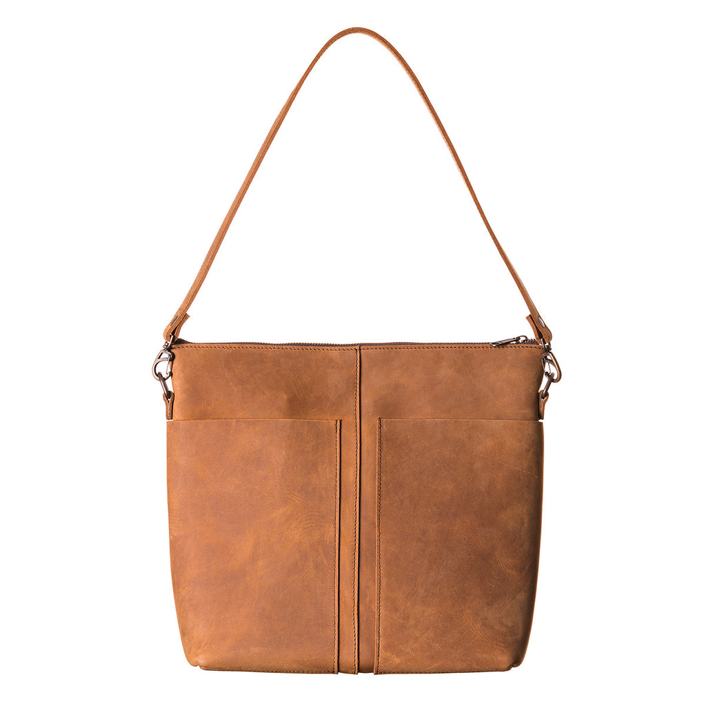 Minimal Leather Bag in cognac, front view with two slip pockets and shoulder strap