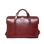 Spurgeon Briefcase in Oxblood, back view with handle straps and riveted leather tab