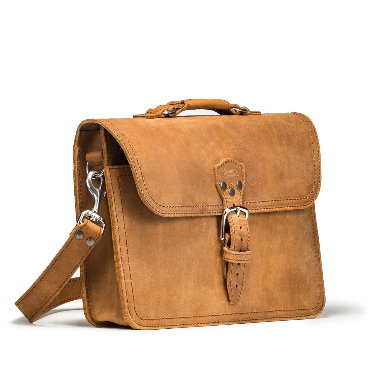 Fourteener Thin Leather Briefcase in Tobacco, angled front view with buckle closure