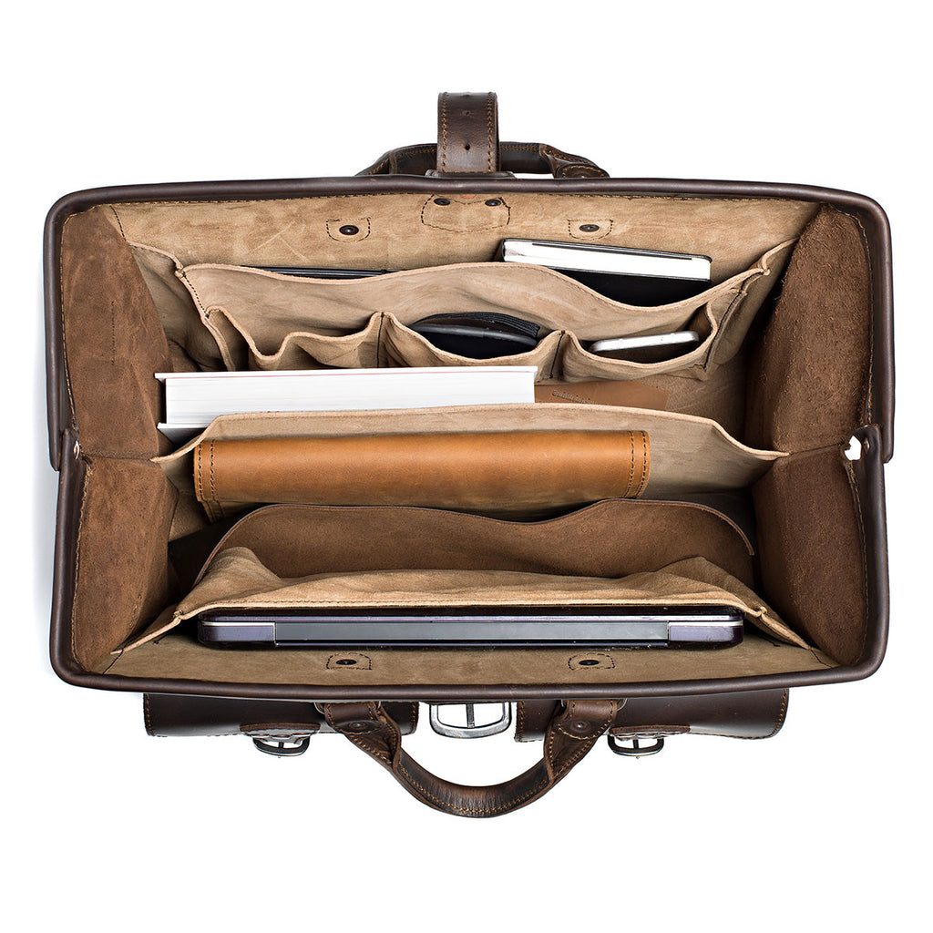 Barrister's Briefcase in Dark Coffee Brown, top view open and packed with a laptop, notebook, phone and leather case
