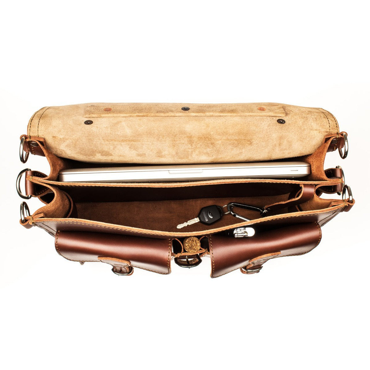 Front Pocket Leather Briefcase in Chestnut, top view with flap open showing a laptop, keys and interior compartments