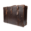 Grandfather Suitcase in Dark Coffee Brown, angled front view with buckle straps and riveted corner caps