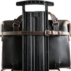 Leather Luggage Strap in Dark Coffee Brown buckled around a briefcase to secure it to a rolling suitcase handle