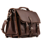 Front Pocket Leather Briefcase in Chestnut, angled front view with buckled front pockets, top handle and shoulder strap