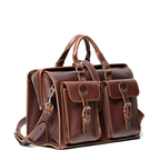 Barrister's Briefcase in Chestnut, angled front view with top handles, two buckled front pockets and shoulder strap