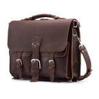 Thin Front Pocket Leather Briefcase in Chestnut, angled front view with two buckled front pockets and shoulder strap
