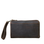 Medium Wristlet Leather Wallet in dark brown, front view with wrist strap and embossed logo