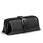 Little Big Mouth Toiletry Bag in Black, angled front view with wide frame opening and buckled strap closure
