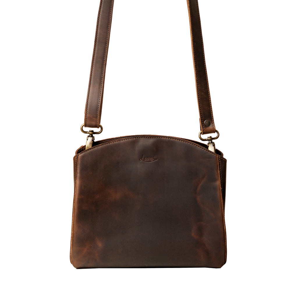 Leather Organizer Crossbody in Dark Coffee Brown, front view with embossed logo and adjustable strap