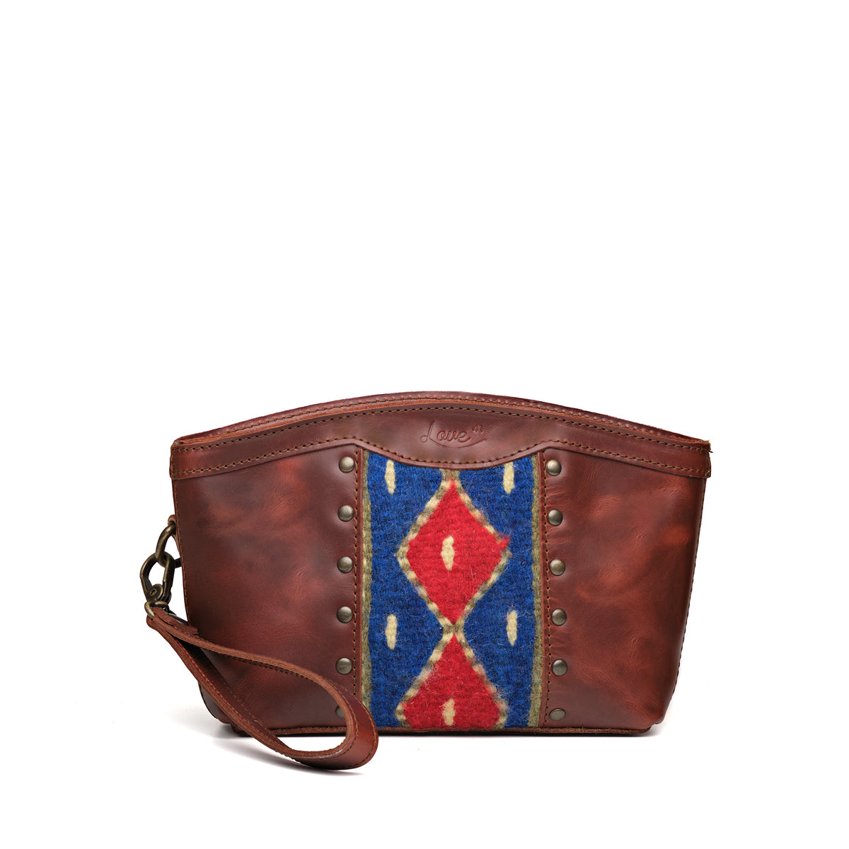 Lanita Leather Clutch in reddish brown, front view with blue and red woven panel, studs and wrist strap