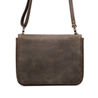 Magnetic Fold Over Bag Large in charcoal gray, front view with fold-over flap, embossed logo and shoulder strap