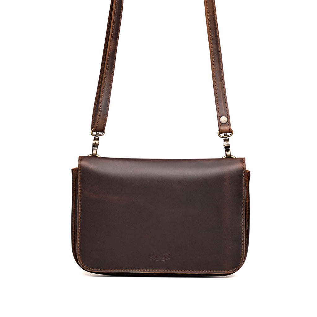 Magnetic Fold Over Bag Medium in Dark Coffee Brown, front view with flap closed and shoulder strap