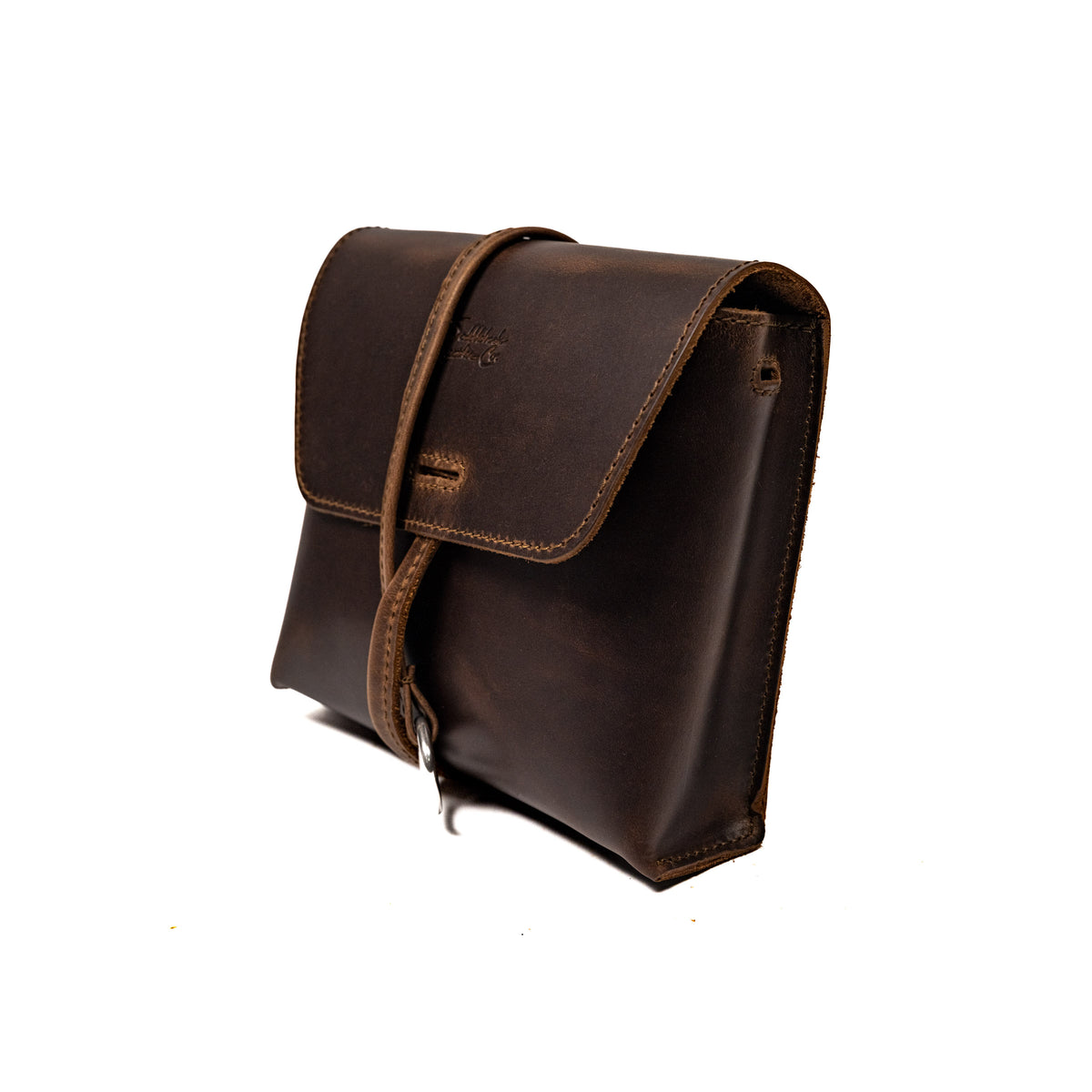 Leather Organizer Bag in Dark Coffee Brown, angled front view with flap closure and wrap-around strap