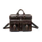 Flight Bag Leather Briefcase in dark brown, front view with two buckled pockets, top handles, and shoulder strap
