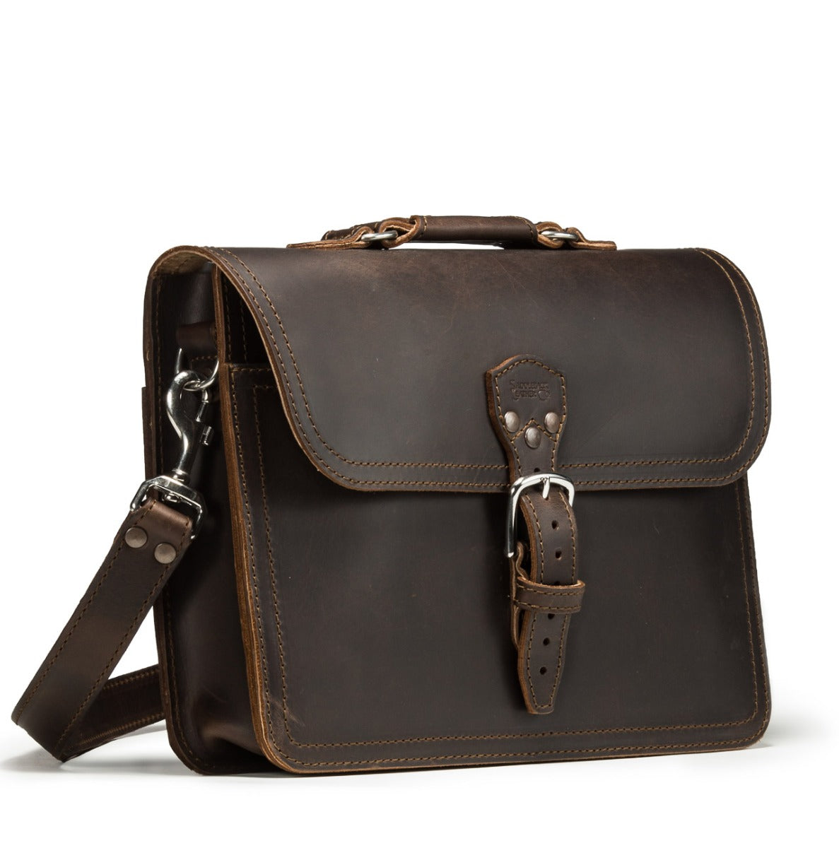 Fourteener Thin Leather Briefcase in Dark Coffee Brown, angled front view with top handle, buckled flap and shoulder strap
