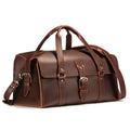 20" Baby Beast Duffle Bag in Chestnut, angled front view with buckle straps and shoulder strap
