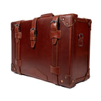 Grandfather Carry On in Chestnut, angled front view with buckle straps and top handle