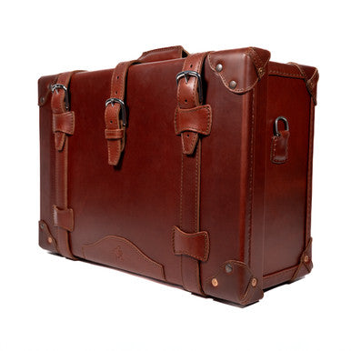 Grandfather Carry On in Chestnut, angled front view with buckle straps and top handle