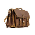 Front Pocket Leather Briefcase in Tobacco, angled front view with buckled front pockets, top handle and shoulder strap