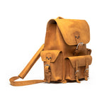 Front Pocket Leather Backpack in Tobacco, angled view with buckled flap, front pockets and strap