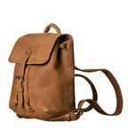 12" Drawstring Backpack in Tobacco, angled view with buckled flap, top handle and shoulder strap