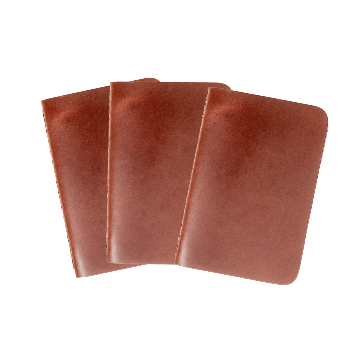 Leather Pocket Notebook Set in Chestnut, three stitched notebooks fanned out
