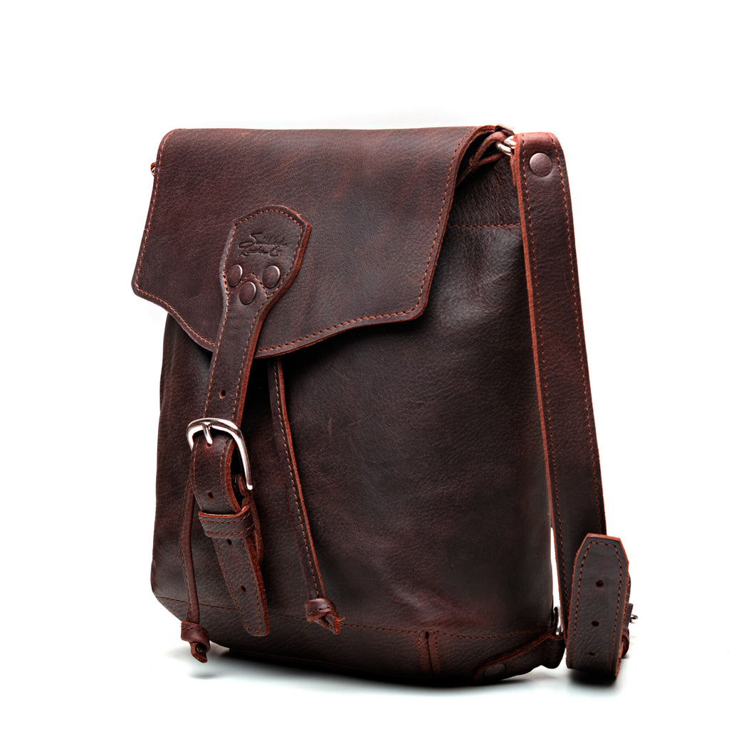 10" Convertible Crossbody in Chestnut, angled front view with buckled flap and strap