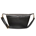 London Sling Large in Black, front view with snap pocket and buckled adjustable strap