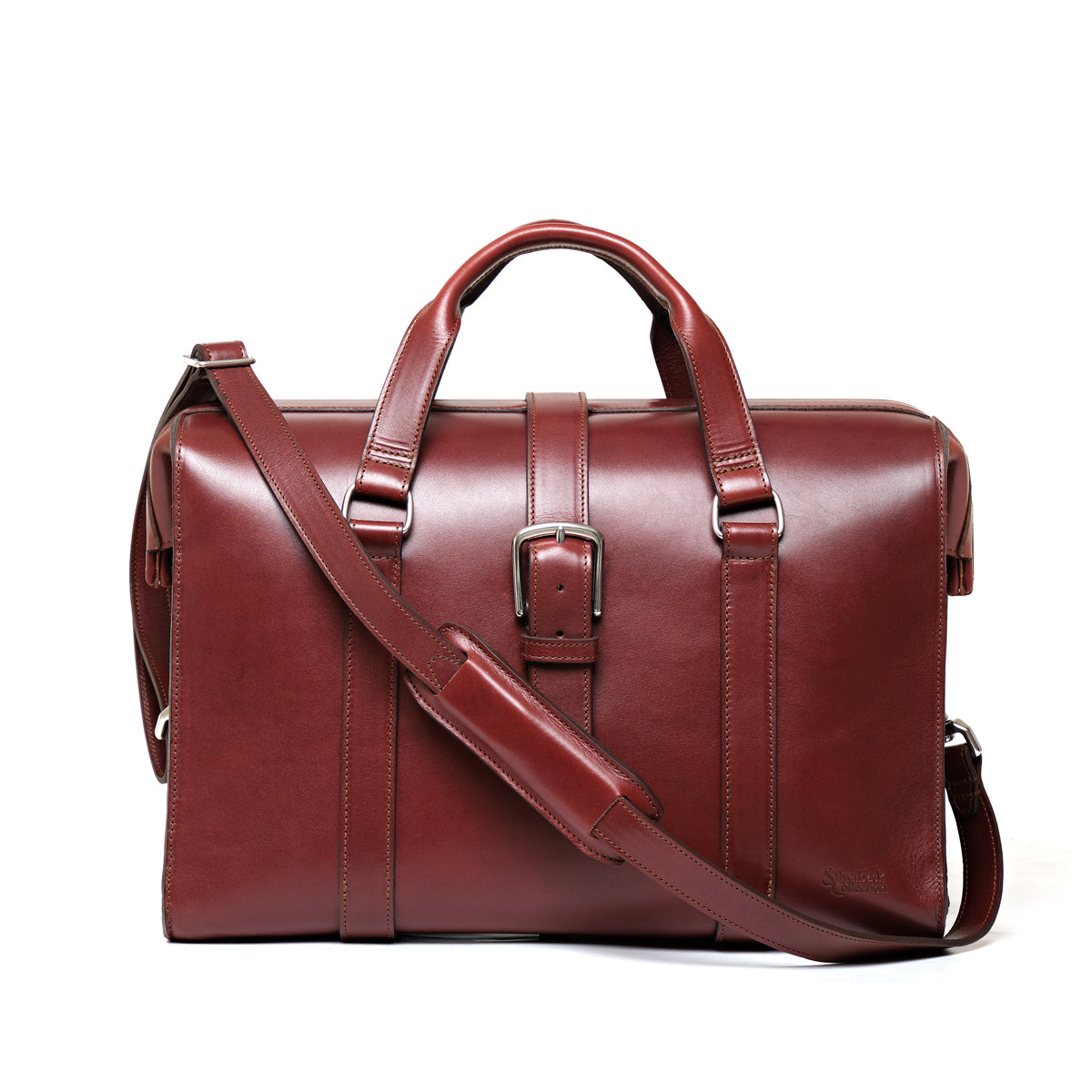 Spurgeon Briefcase in Oxblood, front view with center buckle strap, top handles and shoulder strap