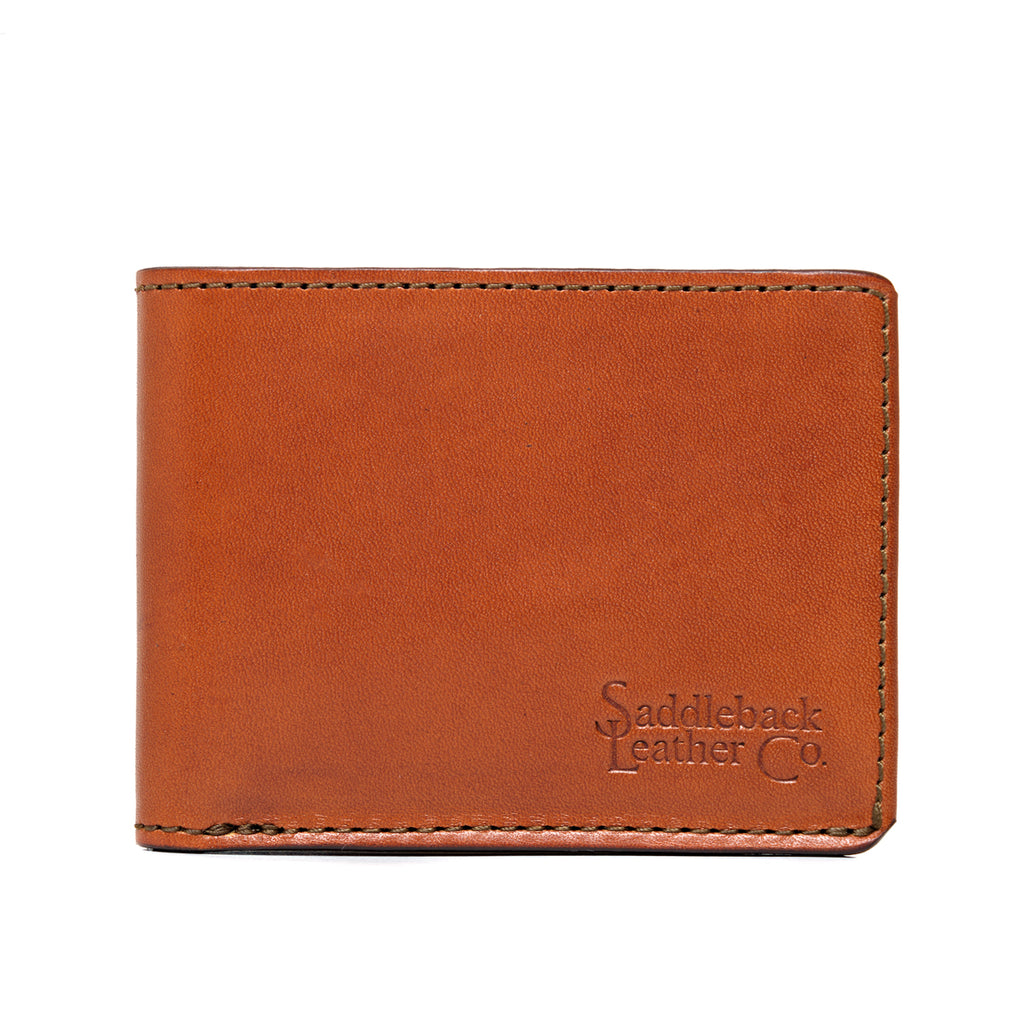William Penn Bifold Wallet in English Tan, closed front view with debossed Saddleback Leather Co. logo