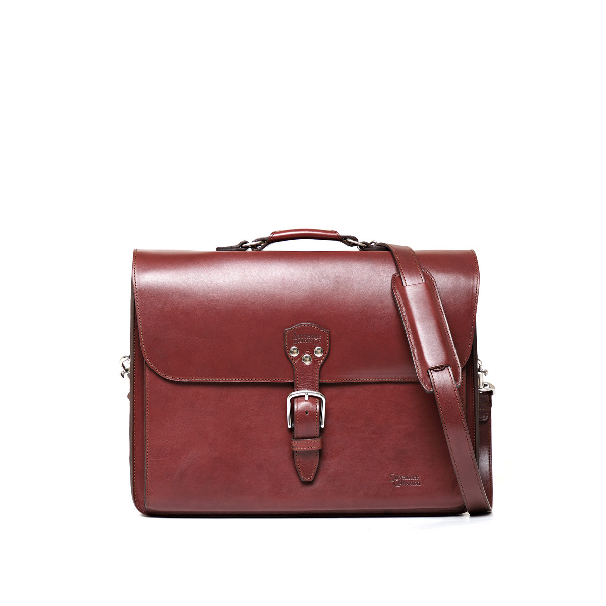 Livingstone Briefcase in Oxblood, front view with buckled flap, top handle and shoulder strap
