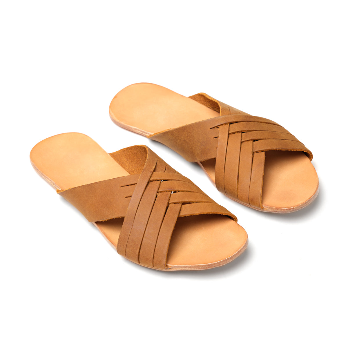 Martha Sandals in Tobacco, angled view of pair with crisscross woven straps and tan footbeds