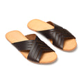 Martha Sandals in Dark Coffee Brown, angled view of pair with crisscross woven straps and tan footbeds