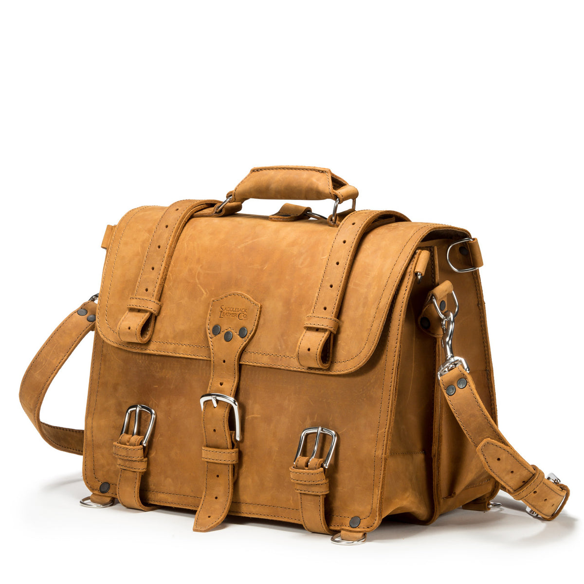 Large Classic Leather Briefcase in Tobacco, angled side view with buckled flap straps, side pocket and shoulder strap