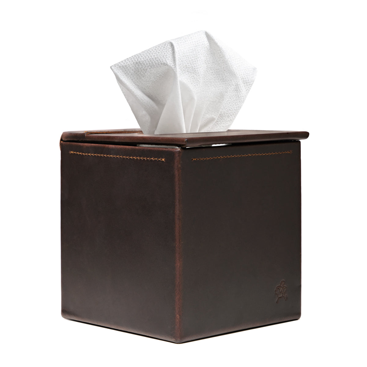 Tissue Box in Dark Coffee Brown leather, angled front view with stitched edges and a tissue pulled from the top slot