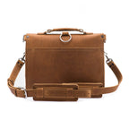 Thin Front Pocket Leather Briefcase in Tobacco, back view with shoulder strap and padded shoulder pad
