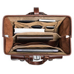 Barrister's Briefcase in Chestnut, top view open and packed with a laptop, notebook, phone and leather case