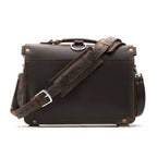 Slim Leather Briefcase in Dark Coffee Brown, back view with padded shoulder strap and luggage handle pass-through