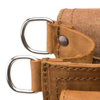 Slim Leather Briefcase in Tobacco, close-up of steel D-rings, copper rivet and hand-stitched side straps