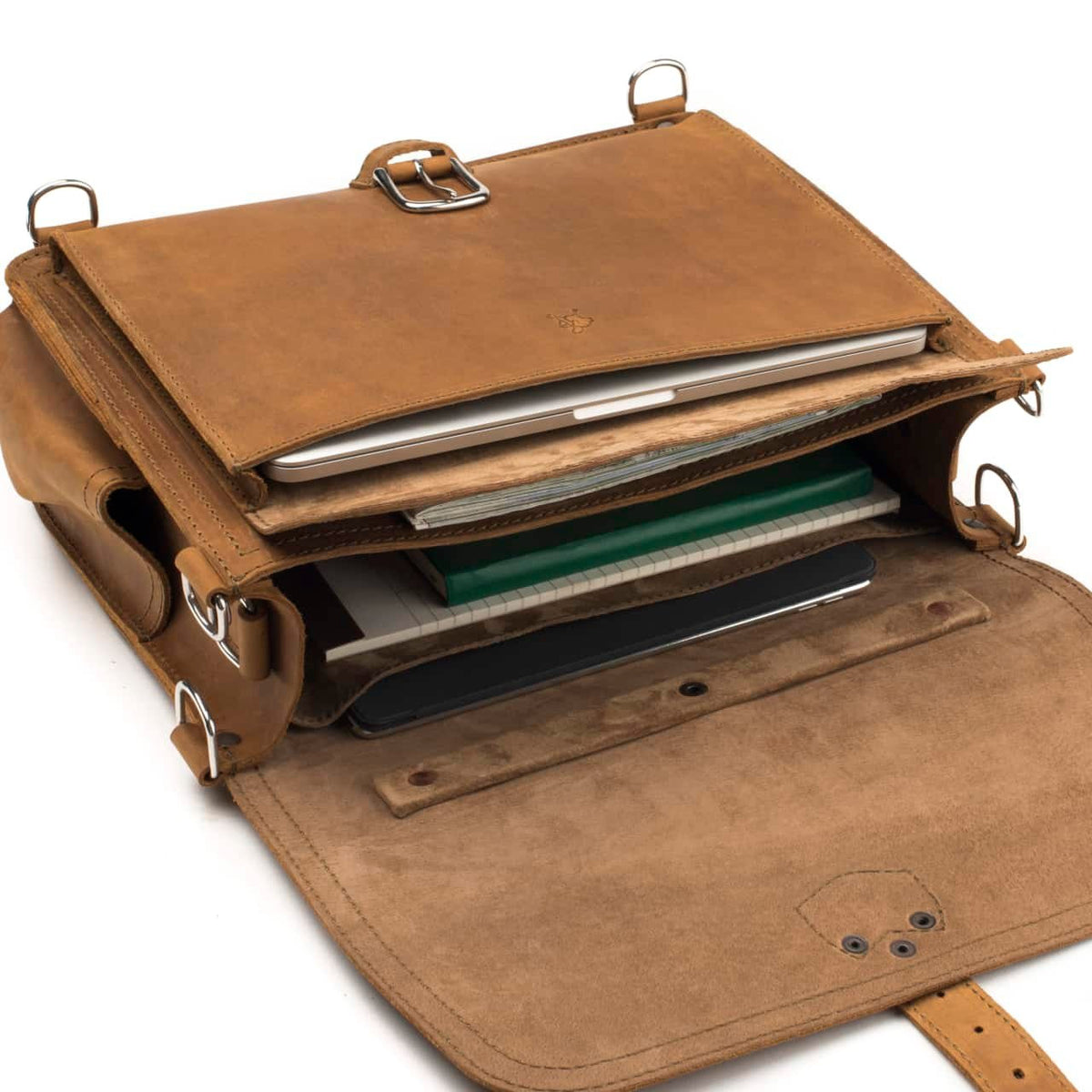 Slim Leather Briefcase in Tobacco, top view with flap open showing a laptop, notebooks and a tablet in the compartments
