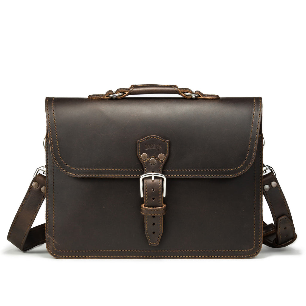 Fourteener Thin Leather Briefcase in Dark Coffee Brown, front view with top handle, buckled flap and shoulder strap