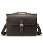 Fourteener Thin Leather Briefcase in Dark Coffee Brown, front view with top handle, buckled flap and shoulder strap