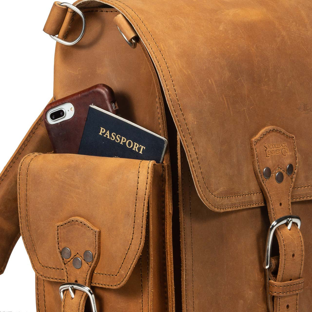 Tank Backpack in Tobacco, close-up of side pocket holding a phone and passport