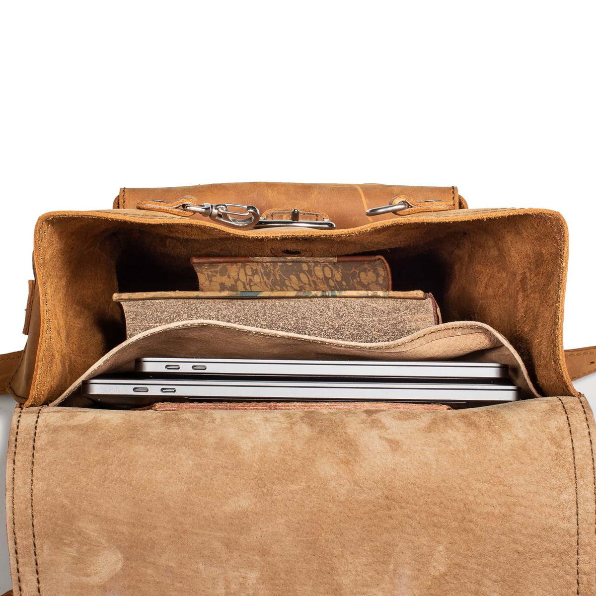 Thin Front Pocket Leather Backpack in Tobacco, top view open with two laptops and books inside