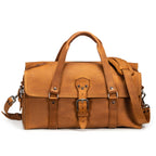 20" Baby Beast Duffle Bag in Tobacco, front view with center buckle strap and shoulder strap