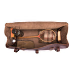 34" Beast Duffle Bag in Chestnut, top view packed with a wooden tennis racket, thermos, shoes and books