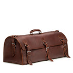34" Beast Duffle Bag in Chestnut, angled front view with three buckle straps and top handle
