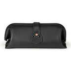 Little Big Mouth Toiletry Bag in Black, back view with riveted strap tab and embossed logo